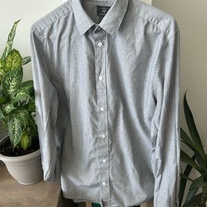 Grey button up long sleeved collared shirt